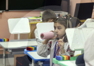 Kharkiv children forced to learn underground as Russia targets schools