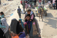 Thousands of Gazans return north to Gaza City
