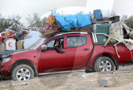 Thousands of Gazans return north to Gaza City
