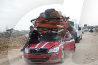 Thousands of Gazans return north to Gaza City