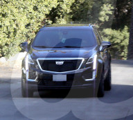 Selena Gomez looks downcast as she is seen for the first time since becoming engulfed in an immigration scandal