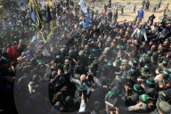 Hamas forces Israeli female hostage thru mob of armed men in dangerous propaganda display