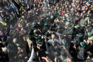 Hamas forces Israeli female hostage thru mob of armed men in dangerous propaganda display