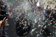 Hamas forces Israeli female hostage thru mob of armed men in dangerous propaganda display
