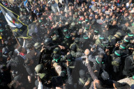 Hamas forces Israeli female hostage thru mob of armed men in dangerous propaganda display
