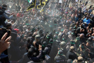 Hamas forces Israeli female hostage thru mob of armed men in dangerous propaganda display