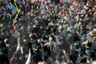 Hamas forces Israeli female hostage thru mob of armed men in dangerous propaganda display