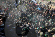 Hamas forces Israeli female hostage thru mob of armed men in dangerous propaganda display