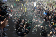 Hamas forces Israeli female hostage thru mob of armed men in dangerous propaganda display
