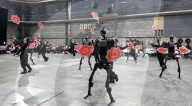 Dancing robot group perform with human 