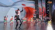 Dancing robot group perform with human 