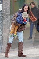 AUSTRIA, SWITZERLAND AND GERMANY ONLY** Aurora Ramazzotti Strolls Through Milan With Son Cesare And Friends - 04 Feb 2025