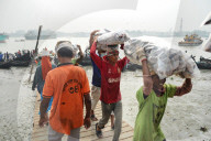 Laborers Unload Fish at Karnaphuli Fish Port - Bangladesh