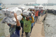 Laborers Unload Fish at Karnaphuli Fish Port - Bangladesh