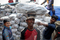 Laborers Unload Fish at Karnaphuli Fish Port - Bangladesh
