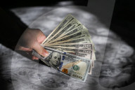 International Currencies In Hand – Financial Illustrations