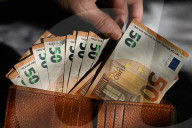 International Currencies In Hand – Financial Illustrations