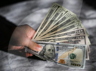 International Currencies In Hand – Financial Illustrations