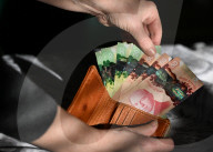 International Currencies In Hand – Financial Illustrations
