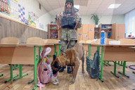 Children evacuated as Kyiv school searched for bomb