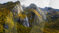 Drone View of Waterfall and Autumn Foliage Near Myrland, Norway
