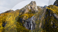 Drone View of Waterfall and Autumn Foliage Near Myrland, Norway