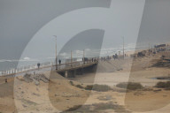 Displaced Gazans walk north