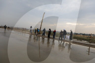Displaced Gazans walk north