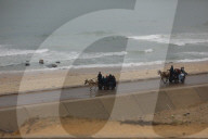Displaced Gazans walk north