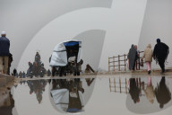 Displaced Gazans walk north