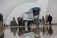 Displaced Gazans walk north