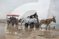 Displaced Gazans walk north