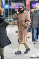 Bradley Cooper strolls in a cozy layered winter look in New York