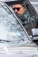 Bradley Cooper strolls in a cozy layered winter look in New York