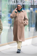Bradley Cooper strolls in a cozy layered winter look in New York