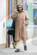 Bradley Cooper strolls in a cozy layered winter look in New York