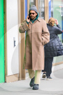 Bradley Cooper strolls in a cozy layered winter look in New York