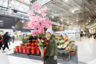 Angela a florist from Isle of Flowers at Waterloo Station, London, UK. 