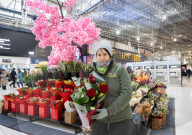 Angela a florist from Isle of Flowers at Waterloo Station, London, UK. 