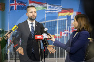 Polish Defense Minister talks to the press at NATO in Brussels