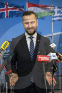 Polish Defense Minister talks to the press at NATO in Brussels