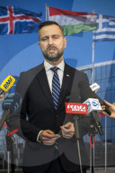 Polish Defense Minister talks to the press at NATO in Brussels
