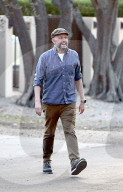 Two and a Half Men and Pretty in Pink alum Jon Cryer, 59, takes care of some domestic chores outside his LA home in a rare public outing