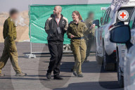 Three hostages released by Hamas arrive Israeli hospital