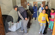 Palestinians mourn at a hospital after an Israeli strike killed three policemen, according to the Hamas-run interior ministry, in Khan Younis
