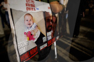 Israelis hold a vigil on second night hostages are freed