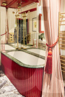 Fashion designer Harris Reed on the 'divine, gilded creativity' of his Holland Park home.