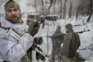 Pro-government forces fight in Ukraine 
