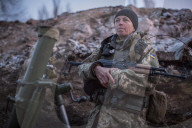 Pro-government forces fight in Ukraine 