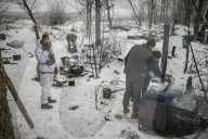 Pro-government forces fight in Ukraine 